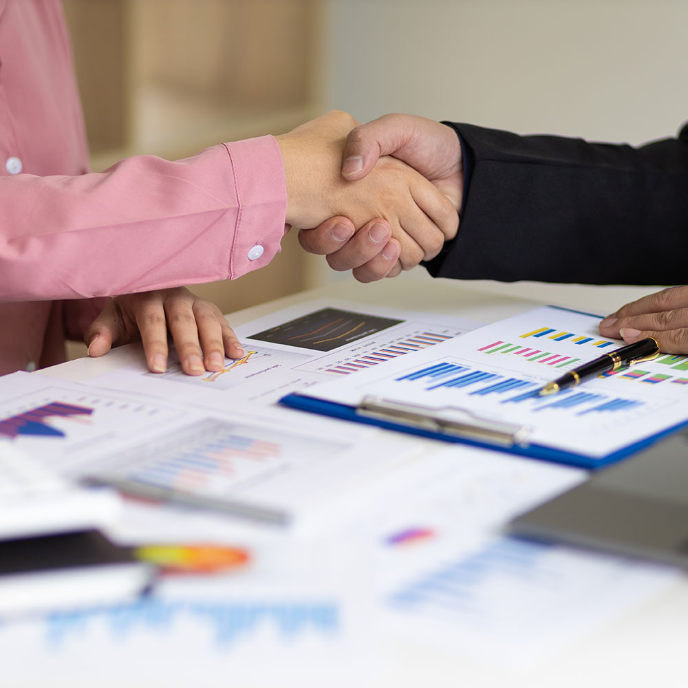 Handshake, business partners shaking hands, business support and